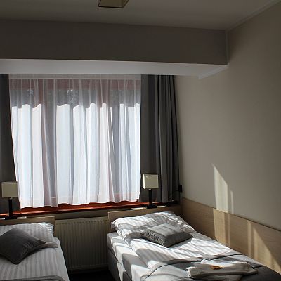 Przykładowa sypialnia w apartamencie 3 osobowym w Pawilonie A
